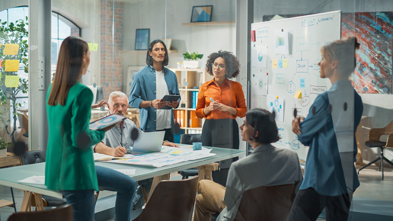 Accounting team gathered in a meeting room to talk about their firm's challenges