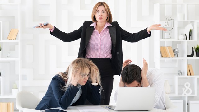 An image of a confused team sitting in front of a laptop because they don't understand how their firm is living up to its mission, vision and values.